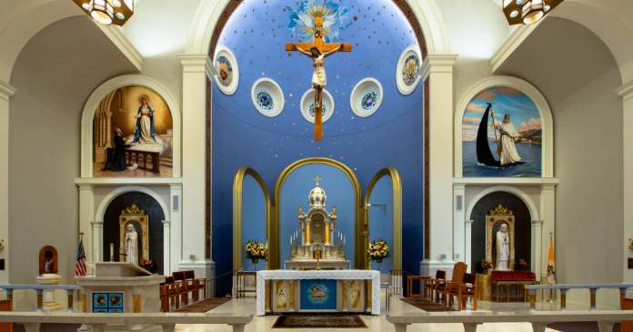 Parishioners appreciate the altar rails at St. Raymond of Penafort Catholic Church in Springfield, Virginia.